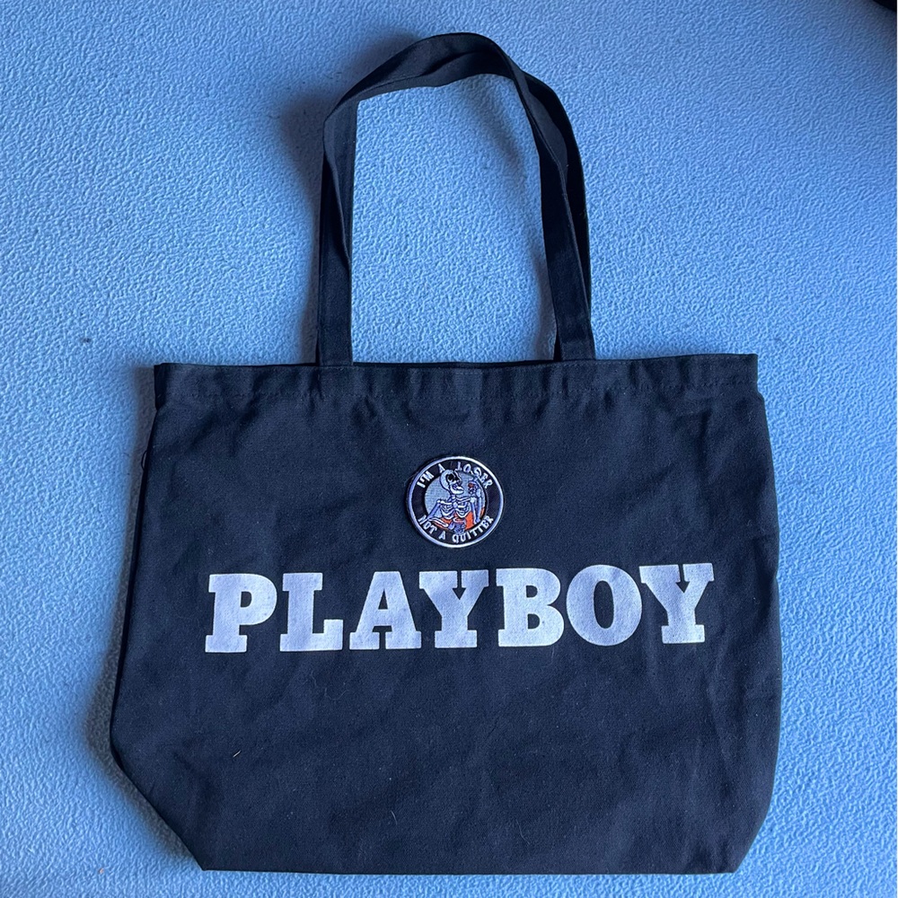 Black Playboy tote bag with white lettering and iron-on patch